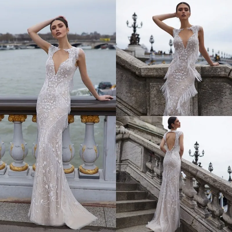 Gorgeous Beach Mermaid Wedding Dress 2019 Lace Appliqued Backless Tulle Bridal Gowns with Tassels Floor Length Vestido De Novia
Gorgeous Beach Mermaid Wedding Dress 2019 Lace Appliqued Backless Tulle Bridal Gowns with Tassels Floor Length Vestido De Novia