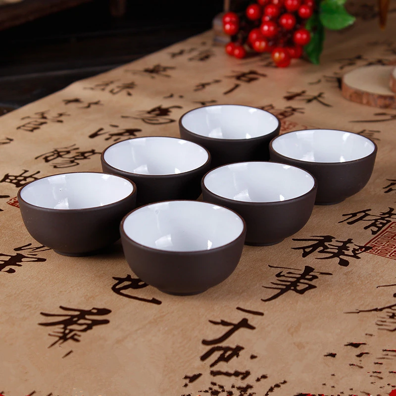 12pcs/lot yixing cups kungfu tea cup purple clay tea set 30ml cups drinkware porcelain tea set
12pcs/lot yixing cups kungfu tea cup purple clay tea set 30ml cups drinkware porcelain tea set
