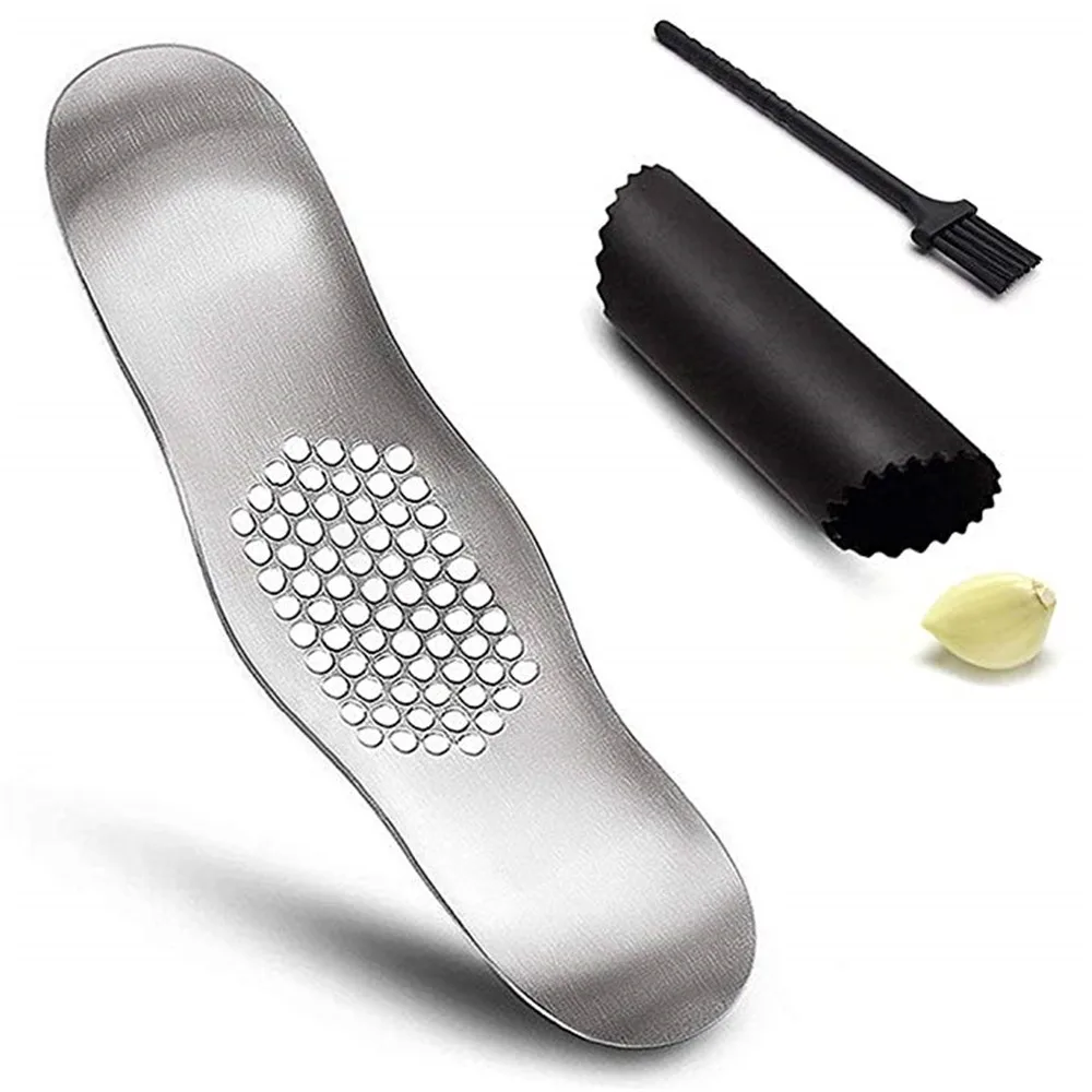 Garlic Press Crusher Rocker with Silicone Peeler and Cleaning Brush Stainless Steel Garlic Chopper Mincer Press Kitchen Tools
Garlic Press Crusher Rocker with Silicone Peeler and Cleaning Brush Stainless Steel Garlic Chopper Mincer Press Kitchen Tools