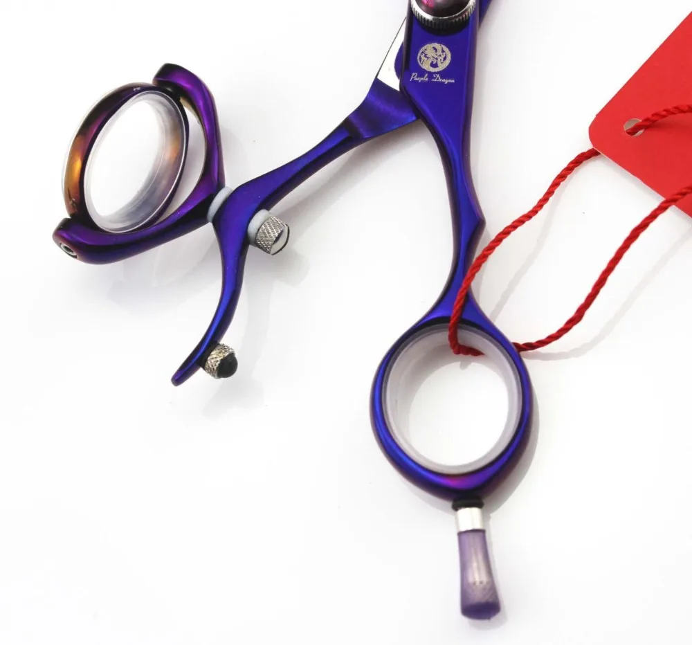 Professional flying cutting hair scissors Japan 440C 5.5 inch purple hairdressing barber salon shears with leather case
Professional flying cutting hair scissors Japan 440C 5.5 inch purple hairdressing barber salon shears with leather case