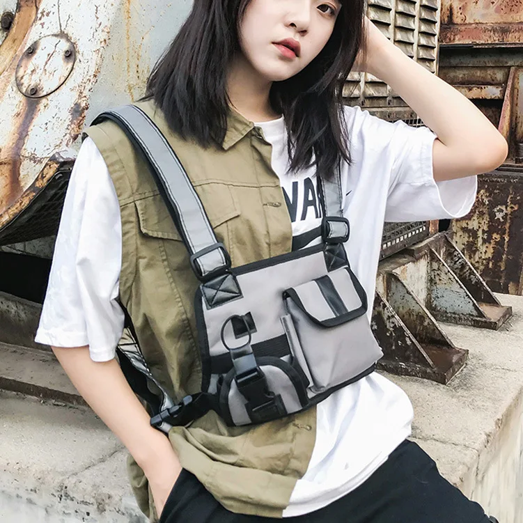 Streetwear Military Chest Rig Bag Men Functional Reflective strap Waist Packs Adjustable Pockets Waistcoat Tactical Chest Bags
Streetwear Military Chest Rig Bag Men Functional Reflective strap Waist Packs Adjustable Pockets Waistcoat Tactical Chest Bags