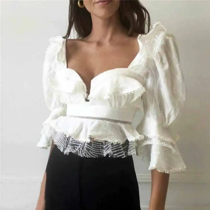 BOHO INSPIRED white blouse women tops female Sexy ruffle crop top square neck shirt female lace trim sleeve sexy women blusas
BOHO INSPIRED white blouse women tops female Sexy ruffle crop top square neck shirt female lace trim sleeve sexy women blusas