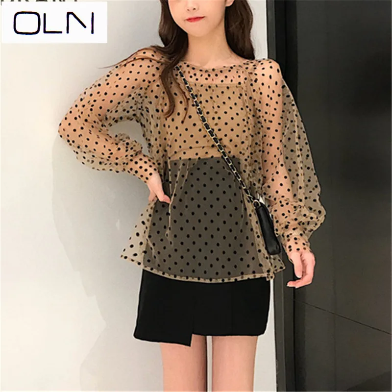 OLN mesh lace Korean version of the wild wave point mesh + solid color sling two-piece shirt women
OLN mesh lace Korean version of the wild wave point mesh + solid color sling two-piece shirt women