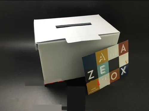 AmazeBox by Mark Shortland magic trick prop: White box with slot and colorful card