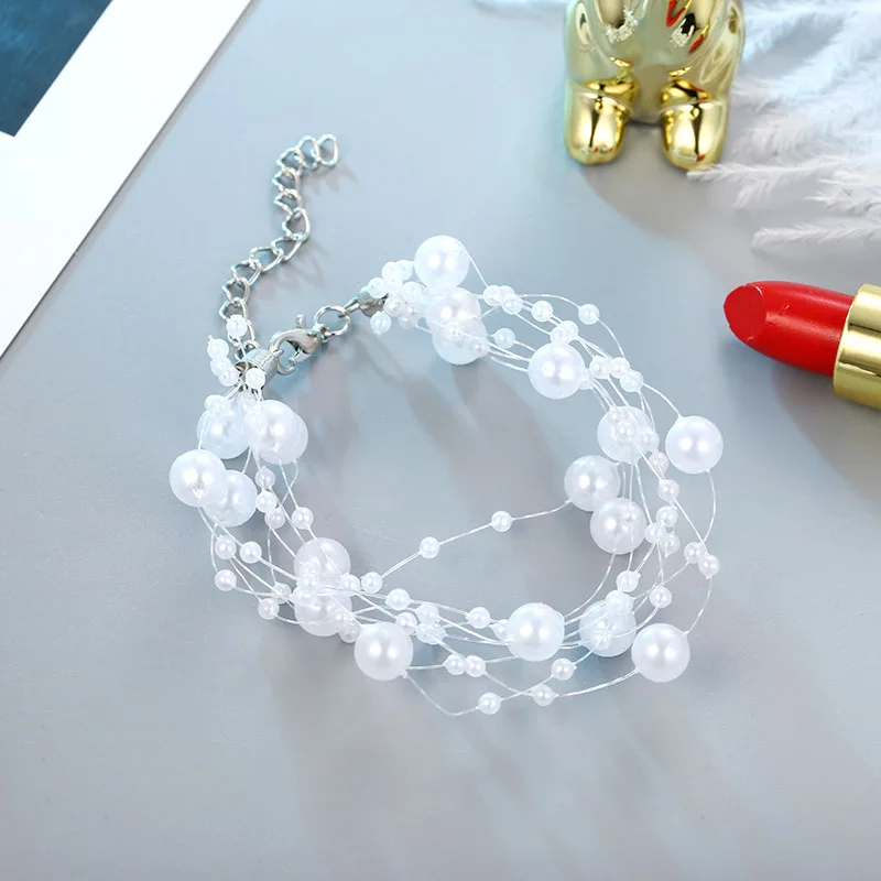 2019 new fashion elegant multi-layer white color simulated pearl bracelets & bangles for women girl wedding party gift
2019 new fashion elegant multi-layer white color simulated pearl bracelets & bangles for women girl wedding party gift