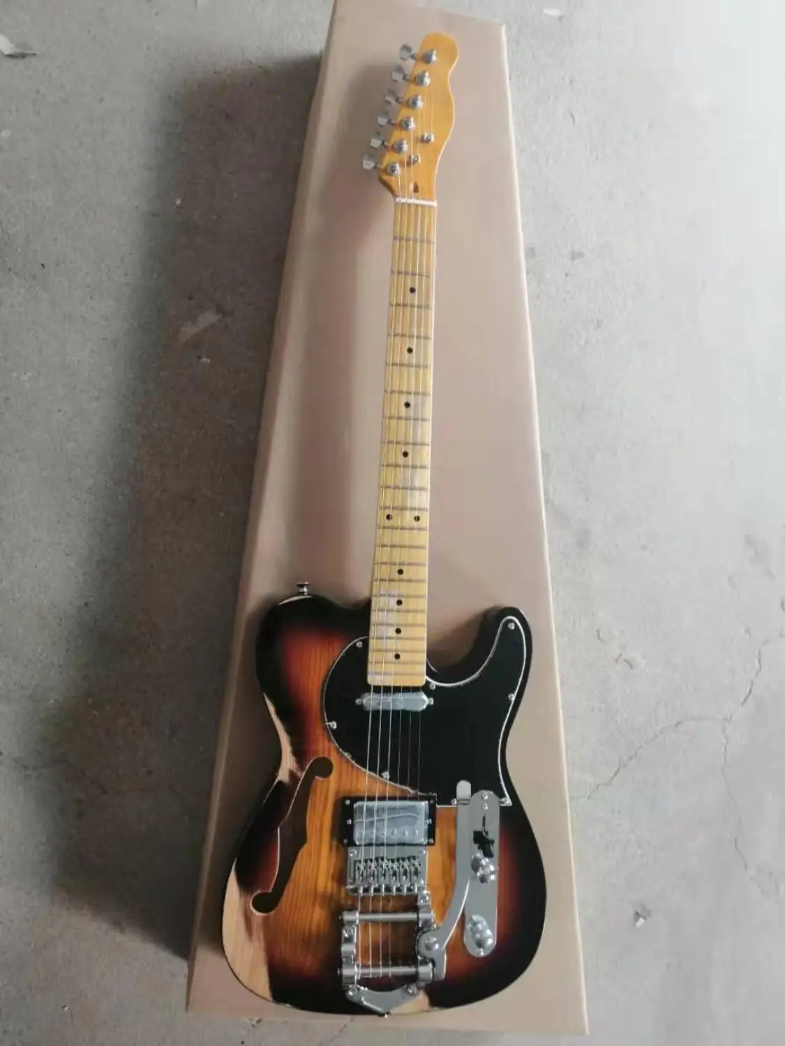 Semi-hollow F hole Relic sunburst color tlr guitar Black Pickguard Maple fretboard Bigsby,customized!T-16
Semi-hollow F hole Relic sunburst color tlr guitar Black Pickguard Maple fretboard Bigsby,customized!T-16