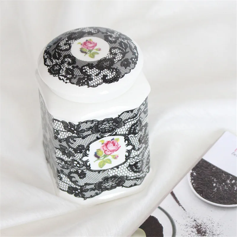 European lace design ceramic decorative cans high quality porcelain home decor craft packaging storage black tea sealed can jar
European lace design ceramic decorative cans high quality porcelain home decor craft packaging storage black tea sealed can jar