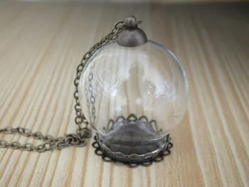 Free ship!! 30x20mm Small glass globe ball pendant bronze flower shape base with cap DIY glass vial necklace pendant
Free ship!! 30x20mm Small glass globe ball pendant bronze flower shape base with cap DIY glass vial necklace pendant