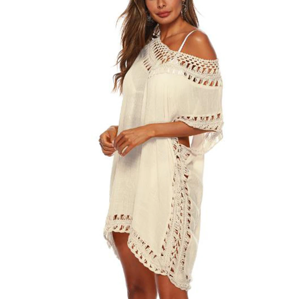 Women Solid Short Sleeve Bathing Blouse V Neck Beach Wear Fashion Holiday Pierced Edge Bikini Cover Up Sunscreen Loose Sexy Swim 
Women Solid Short Sleeve Bathing Blouse V Neck Beach Wear Fashion Holiday Pierced Edge Bikini Cover Up Sunscreen Loose Sexy Swim