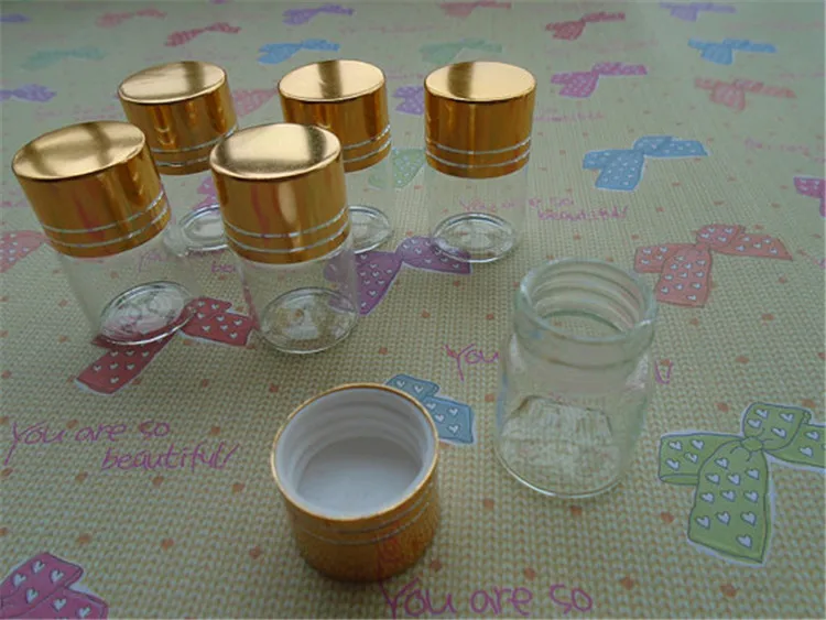 50 Small Glass Bottles With Gold Metal Cap. Miniature, tiny, Potion, Vials. DIY Pendant 22mmx40mm 
50 Small Glass Bottles With Gold Metal Cap. Miniature, tiny, Potion, Vials. DIY Pendant 22mmx40mm