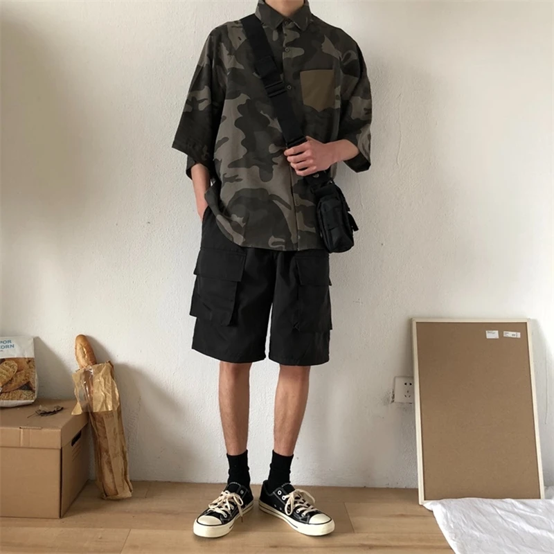 Neutral men and women American retro casual personality camouflage half sleeve shirt Japanese and Korean tooling shirt
Neutral men and women American retro casual personality camouflage half sleeve shirt Japanese and Korean tooling shirt