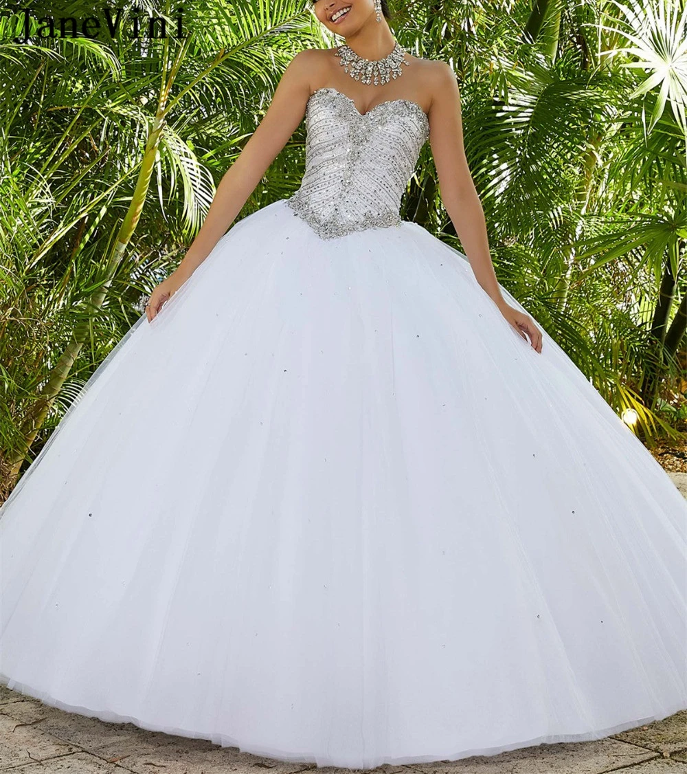 JaneVini Luxury Princess White Long Quinceanera Dresses Ball Gown Sweetheart Shiny Beaded Sleeveless Puffy Tulle Debutante Gowns
JaneVini Luxury Princess White Long Quinceanera Dresses Ball Gown Sweetheart Shiny Beaded Sleeveless Puffy Tulle Debutante Gowns