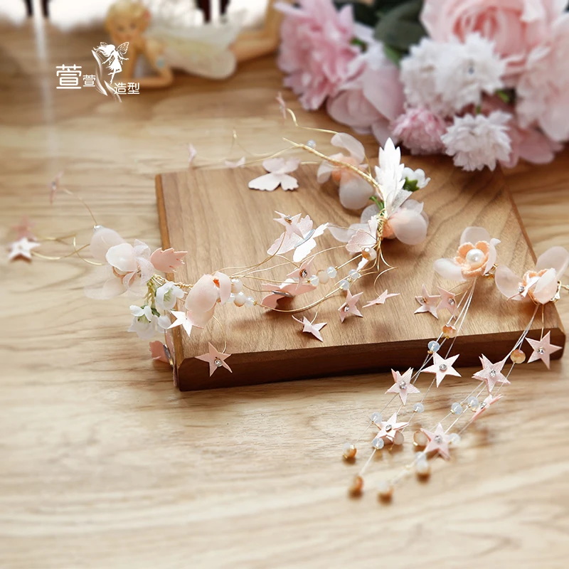 bride's headgear super-fairy sweet flower hairband earrings sets wedding tiara brides
bride's headgear super-fairy sweet flower hairband earrings sets wedding tiara brides