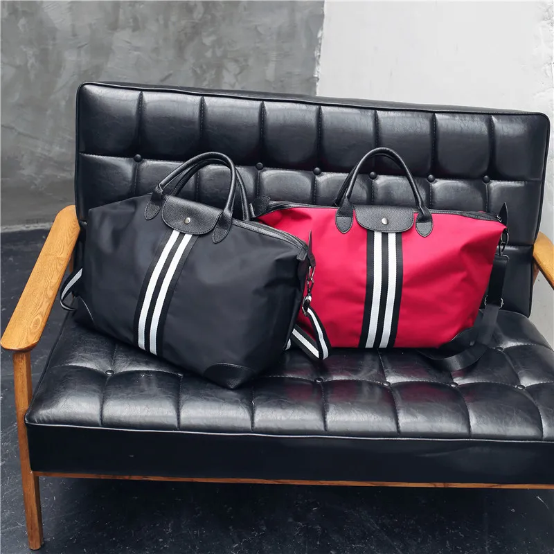 New Unisex Nylon Travel Bag Korean Short Distance Flight Bag Large Capacity Duffel Bag Portable Reistas Black Handbags HM-1701 
New Unisex Nylon Travel Bag Korean Short Distance Flight Bag Large Capacity Duffel Bag Portable Reistas Black Handbags HM-1701