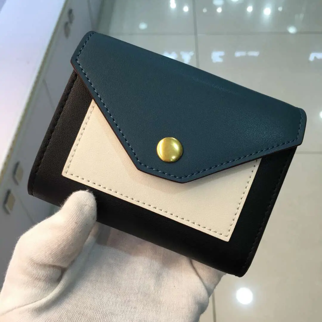 Color matching envelope wallet short three fold ladies wallet color matching color short leather leather small handbag new
Color matching envelope wallet short three fold ladies wallet color matching color short leather leather small handbag new