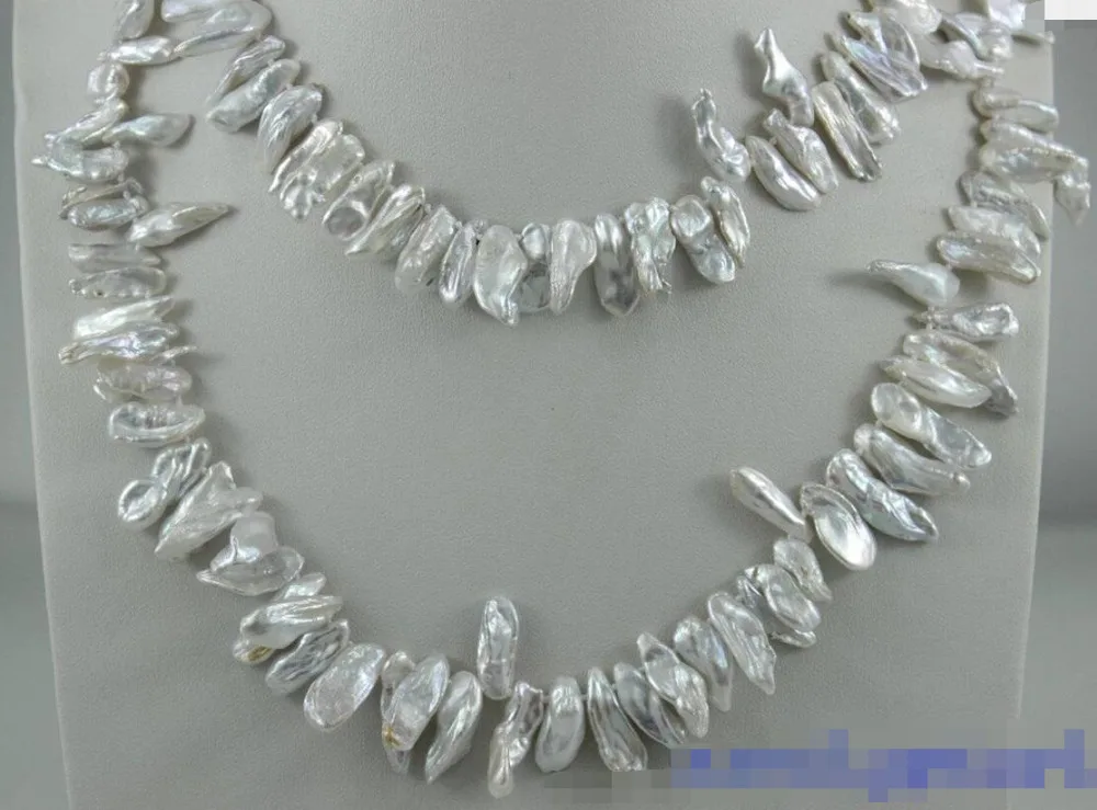 ddh003803 White keshi reborn pearl long necklace 35INCH 8x21mm No Metal "Handmade
ddh003803 White keshi reborn pearl long necklace 35INCH 8x21mm No Metal "Handmade