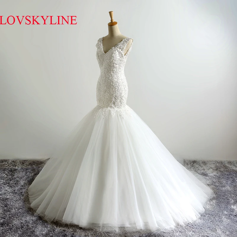 The new special off the shoulder actual picture lace classic deep V-neck lace shoulder Puffy skirt wedding dress
The new special off the shoulder actual picture lace classic deep V-neck lace shoulder Puffy skirt wedding dress