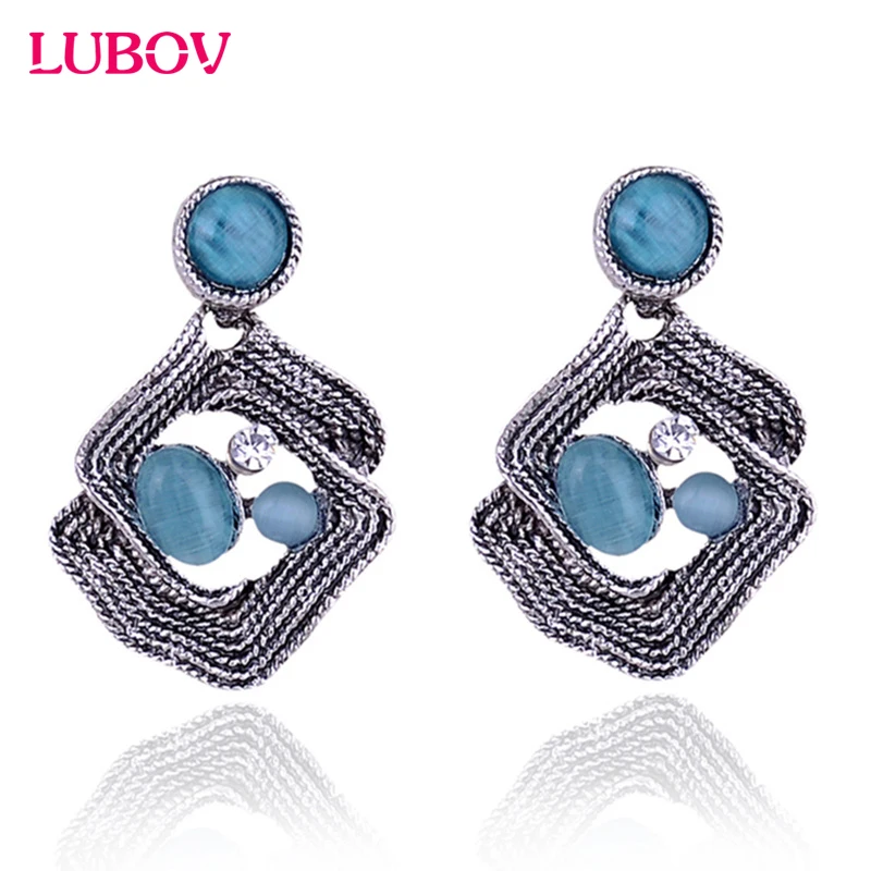 Fashion Cat Eye Stone Rhinestone Stud Earrings Silver Metal Wire Tangled Piercing Earrings Women Fashion Jewelry Christmas Gift
Fashion Cat Eye Stone Rhinestone Stud Earrings Silver Metal Wire Tangled Piercing Earrings Women Fashion Jewelry Christmas Gift