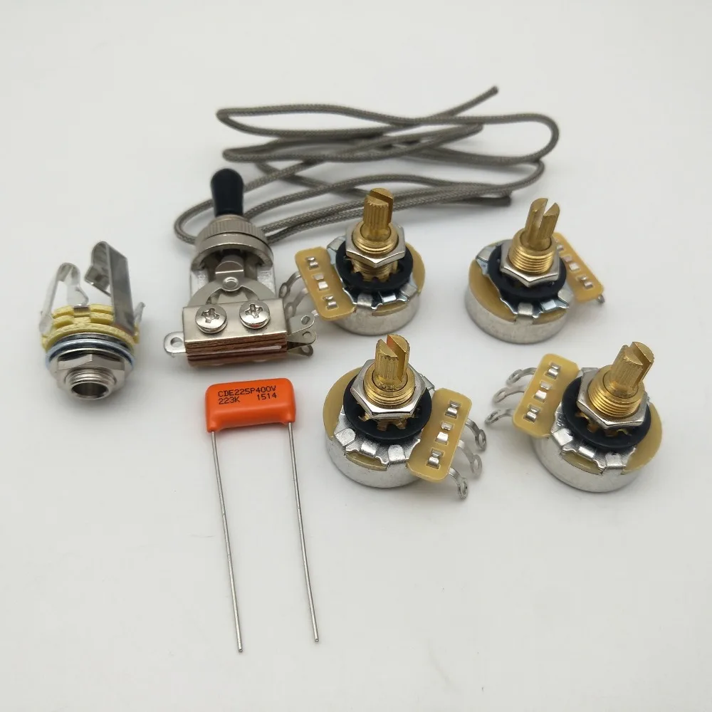 Deluxe CTS 500K Copper shaft Wiring Kit for-LP Guitar CDE .022 400V Orange Drop Cap
Deluxe CTS 500K Copper shaft Wiring Kit for-LP Guitar CDE .022 400V Orange Drop Cap