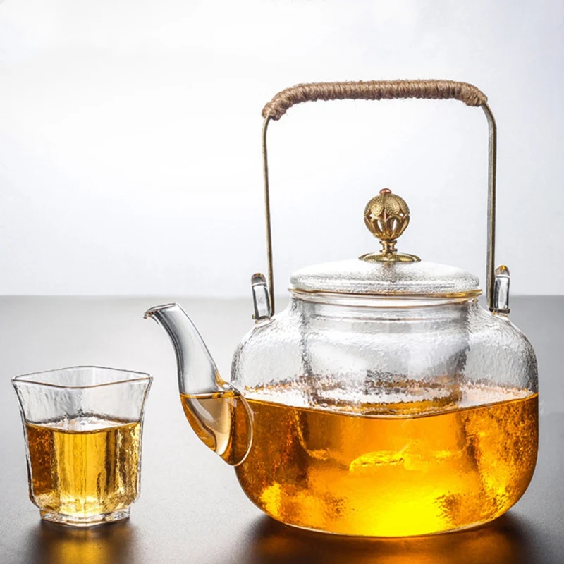 High Heat Resistant Borosilicate 700Ml Teapot Clear Glass Heat Resistant Square Shape Hammer Pattern Pure Copper Teapot Handle
High Heat Resistant Borosilicate 700Ml Teapot Clear Glass Heat Resistant Square Shape Hammer Pattern Pure Copper Teapot Handle