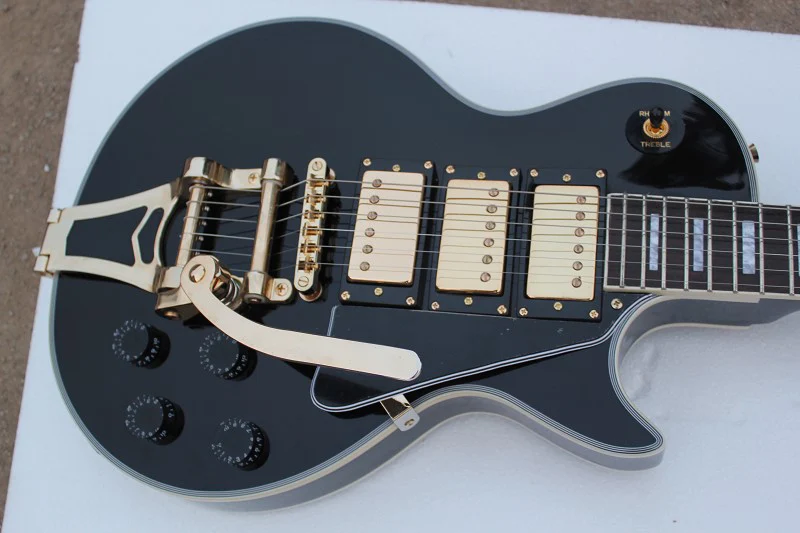 China guitar factory custom new L 3 pickup Electric Guitar, Black Free shipping 7yue31
China guitar factory custom new L 3 pickup Electric Guitar, Black Free shipping 7yue31