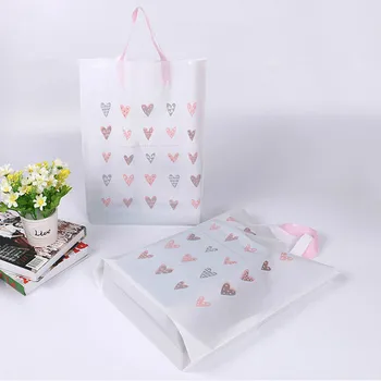 50pcs Love pattern clothing bag plastic bag with handle thickening gift jewelry books packing bags
50pcs Love pattern clothing bag plastic bag with handle thickening gift jewelry books packing bags