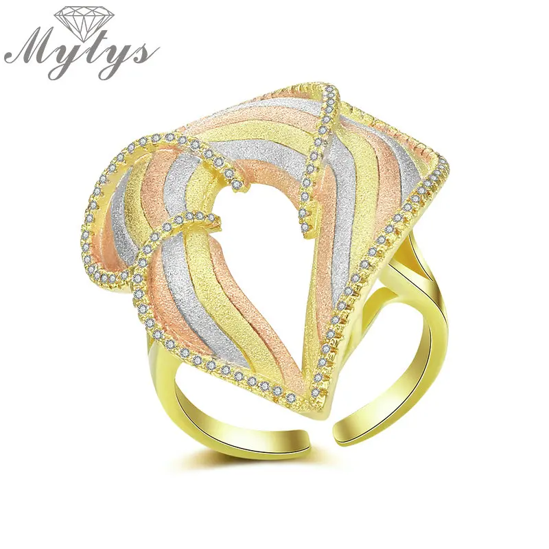 Mytys Hollow Leaf Flower Shape Three Tone Gold Ring For Women High Quality Sand Blast Technology Jewelry Fashion Accessory R2060
Mytys Hollow Leaf Flower Shape Three Tone Gold Ring For Women High Quality Sand Blast Technology Jewelry Fashion Accessory R2060
