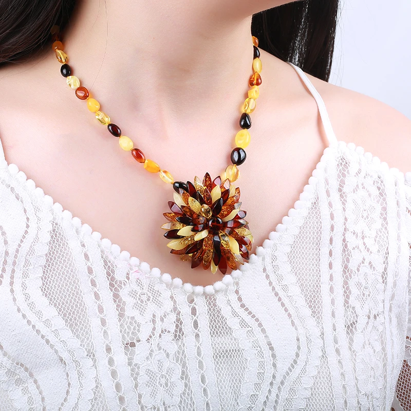 Genuine 100% natural multi-color pendant drop-shaped sweater chain original stone amber pendant necklace men and women models
Genuine 100% natural multi-color pendant drop-shaped sweater chain original stone amber pendant necklace men and women models
