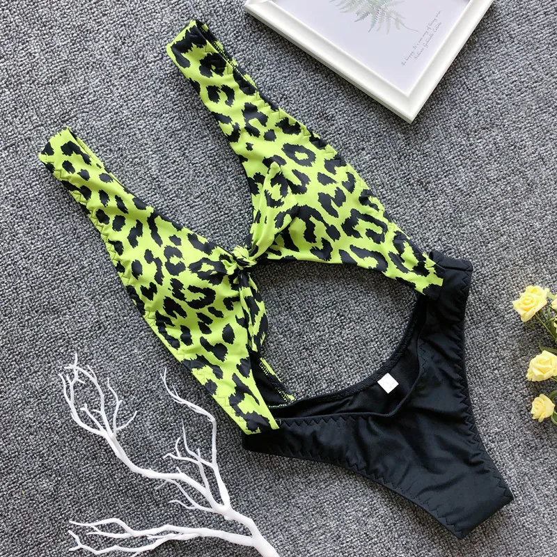 Leopard printed swimwear Sexy deep V neck swimsuit women 2019 new front knot bikini sets female High cut bodysuits one-pieces
Leopard printed swimwear Sexy deep V neck swimsuit women 2019 new front knot bikini sets female High cut bodysuits one-pieces