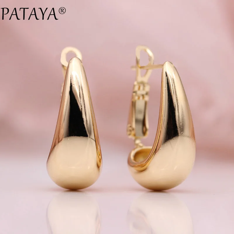 PATAYA New 585 Rose Gold Glossy Dangle Earrings Women Simple Wedding Party Gift Fine Fashion Jewelry Moon Shape Hollow Ear Hook
PATAYA New 585 Rose Gold Glossy Dangle Earrings Women Simple Wedding Party Gift Fine Fashion Jewelry Moon Shape Hollow Ear Hook