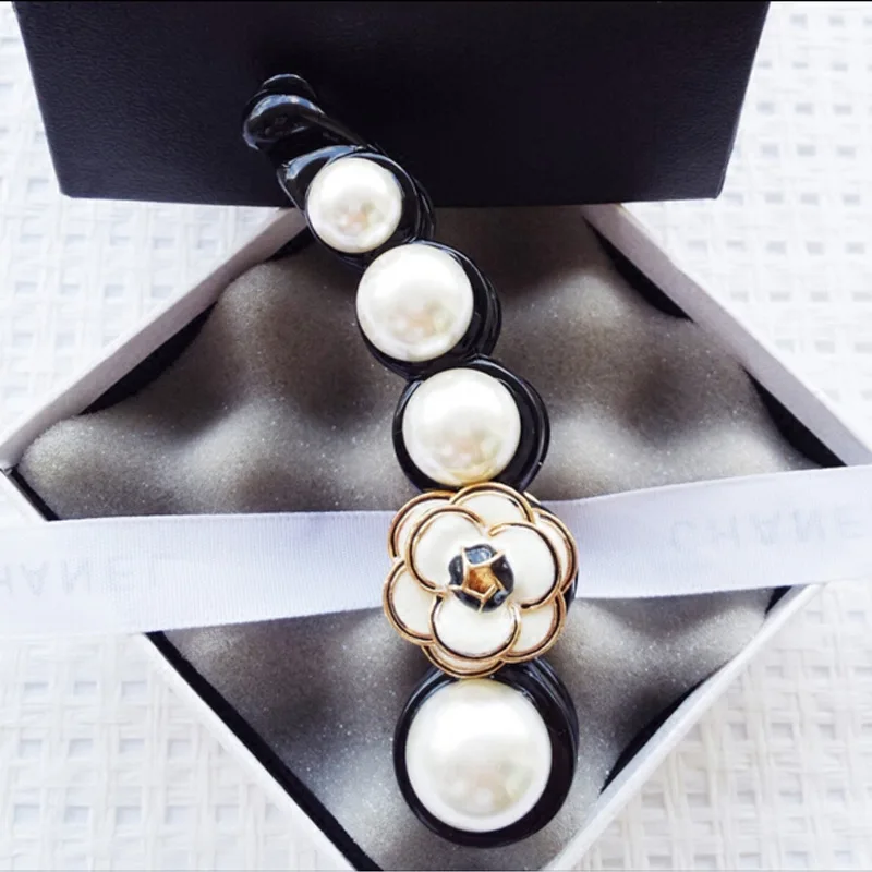 2019 explosion models Korean cute banana clip horsetail clip Pearl Camellia vertical clip female hair accessories sale
2019 explosion models Korean cute banana clip horsetail clip Pearl Camellia vertical clip female hair accessories sale