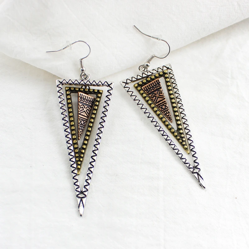 Exaggerated Retro Triangle Earring Multi-layer Geometric Hollow Triangle Indian Totem Hanging Earring Female Personality Jewelry
Exaggerated Retro Triangle Earring Multi-layer Geometric Hollow Triangle Indian Totem Hanging Earring Female Personality Jewelry
