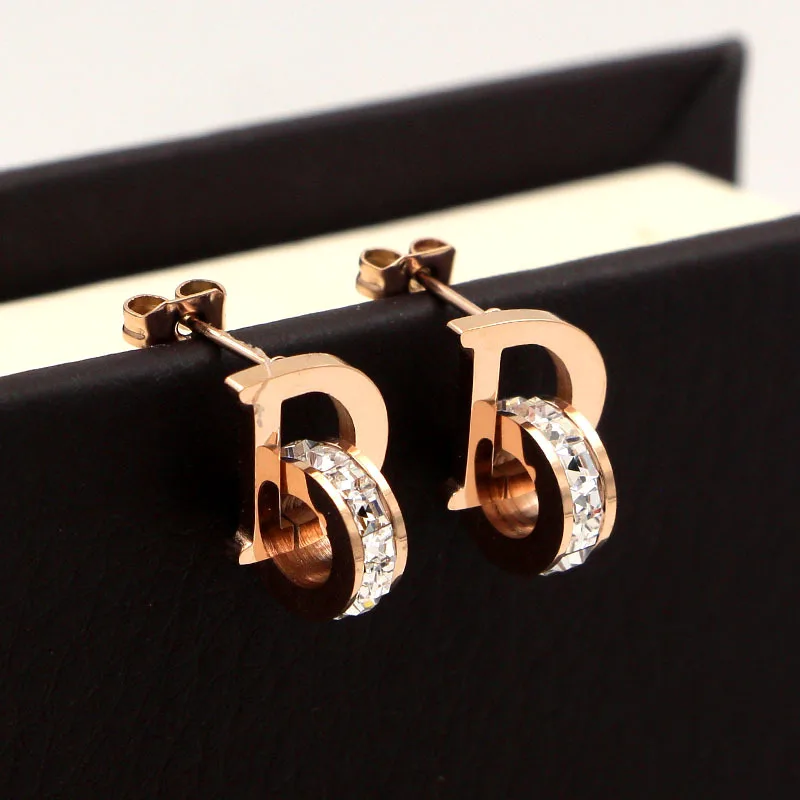 Unique Design Letter D Cubic Zirconia Stud earrings Titanium Steel rose gold color fashion Women Jewelry , factory prices
Unique Design Letter D Cubic Zirconia Stud earrings Titanium Steel rose gold color fashion Women Jewelry , factory prices