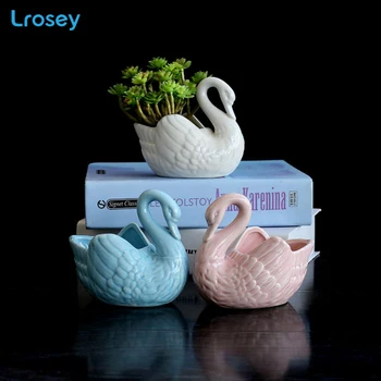 European white swan flower vase tabletop pot ceramic crafts creative office gardening diy home decoration accessories modern
European white swan flower vase tabletop pot ceramic crafts creative office gardening diy home decoration accessories modern