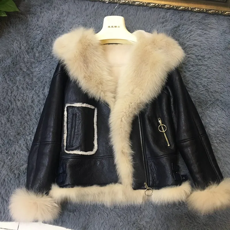 2018 new luxury fashion women genuine leather sheepskin fur coat with hoody 100% natural fox fur sheep fur and leather jacket
2018 new luxury fashion women genuine leather sheepskin fur coat with hoody 100% natural fox fur sheep fur and leather jacket