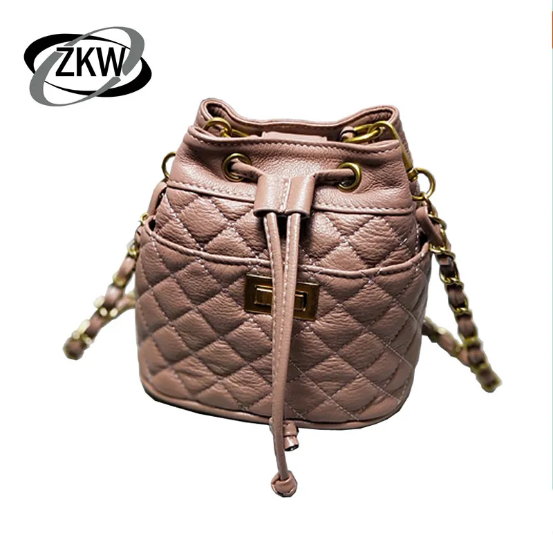 ZKW New First Layer Cowhide Chain Plaid Pumping Woman Bucket Bag Shoulder Slanting Personality Mini Genuine Leather Handbag 
ZKW New First Layer Cowhide Chain Plaid Pumping Woman Bucket Bag Shoulder Slanting Personality Mini Genuine Leather Handbag