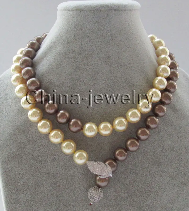 FREE SHIPPING HOT sell new Style >>>> 35" 12mm perfect round coffee & golden south sea shell pearl necklace
FREE SHIPPING HOT sell new Style >>>> 35" 12mm perfect round coffee & golden south sea shell pearl necklace