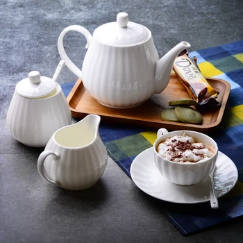Plain white bone china cafe sugar bowl cream boat, pumpkin creative design, cafe milk jug, milk pitcher, coffee accessories
Plain white bone china cafe sugar bowl cream boat, pumpkin creative design, cafe milk jug, milk pitcher, coffee accessories