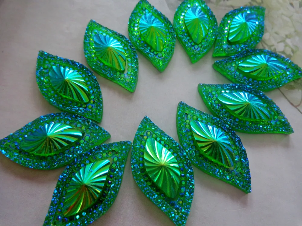 50pcs 15*30mm Navette shape crystal Sew On rhinestones green resin gem stones flatback strass
50pcs 15*30mm Navette shape crystal Sew On rhinestones green resin gem stones flatback strass