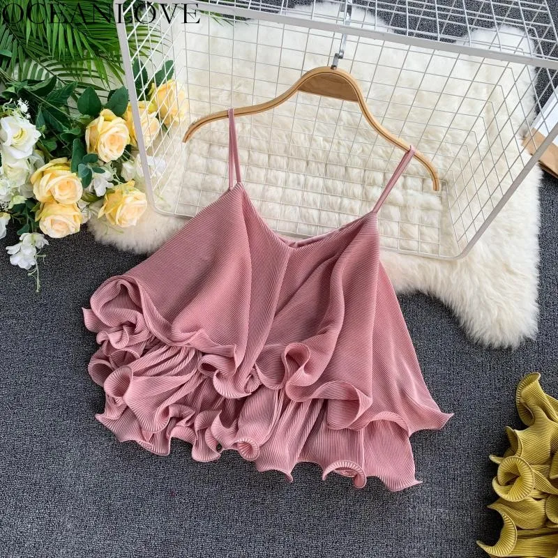 OCEANLOVE Solid V-neck Backless Sexy Crop Tops Ruffles Sleeveless Chiffon Tank Top 2019 Summer Short All Match Loose Camis 11357
OCEANLOVE Solid V-neck Backless Sexy Crop Tops Ruffles Sleeveless Chiffon Tank Top 2019 Summer Short All Match Loose Camis 11357