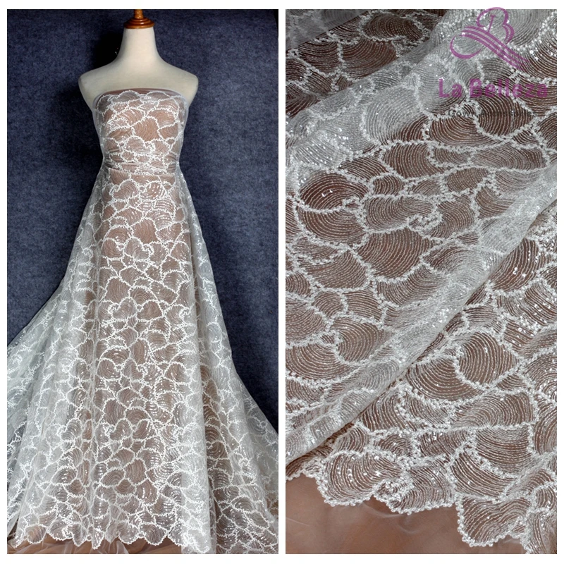 La Belleza 1 yard 2019 wedding gown beartiful new desinge off white rayon with clear sequins on mesh embroidery lace fabric
La Belleza 1 yard 2019 wedding gown beartiful new desinge off white rayon with clear sequins on mesh embroidery lace fabric