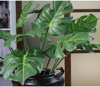 1Pc Real touch Artificial Palm tree leaves latex coating Monstera leaf plastic plant branch for Home wedding decoration
1Pc Real touch Artificial Palm tree leaves latex coating Monstera leaf plastic plant branch for Home wedding decoration