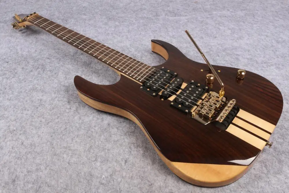 Custom 6 Strings Guitar neck Thru Body rosewood body Electric Guitar with rose tremolo gold hardware
Custom 6 Strings Guitar neck Thru Body rosewood body Electric Guitar with rose tremolo gold hardware