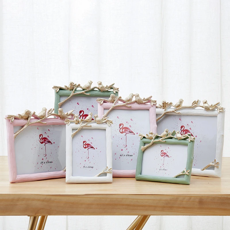Modern Resin photo frame Desktop Arts Ornaments Bamboo bird Picture Frames Holder marcos para fotos Home decoration Accessories
Modern Resin photo frame Desktop Arts Ornaments Bamboo bird Picture Frames Holder marcos para fotos Home decoration Accessories