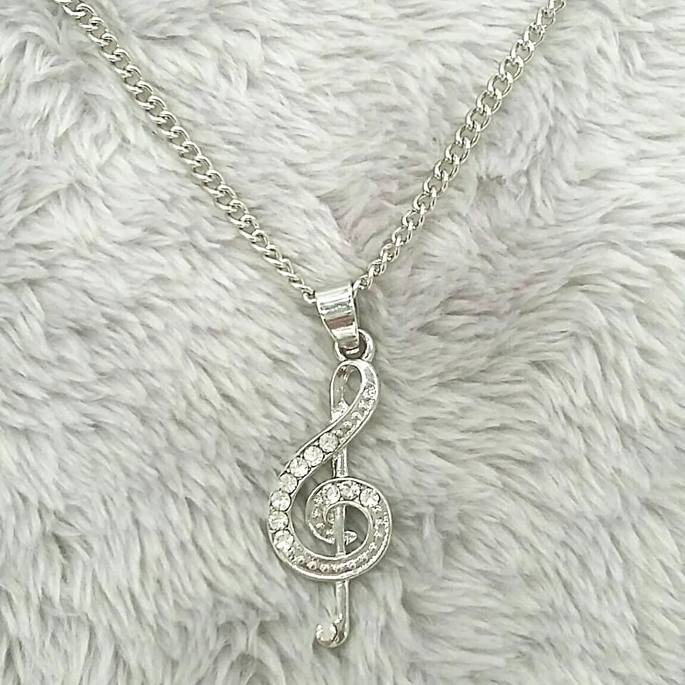 Silver Color Treble Clef crystal Necklace Music symbol G Clef Necklace Snake chain Music Note Pendant Necklaces for Girls
Silver Color Treble Clef crystal Necklace Music symbol G Clef Necklace Snake chain Music Note Pendant Necklaces for Girls