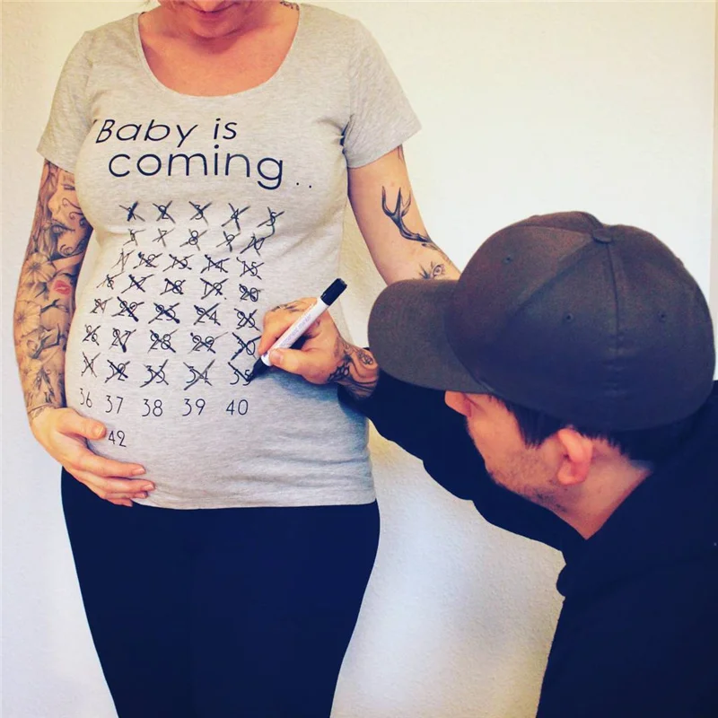 Dreamlikelin Baby Is Coming Print Maternity Pregnant T shirts Women Cotton Calendar Funny Clothes Summer Plus Size T Shirt
Dreamlikelin Baby Is Coming Print Maternity Pregnant T shirts Women Cotton Calendar Funny Clothes Summer Plus Size T Shirt