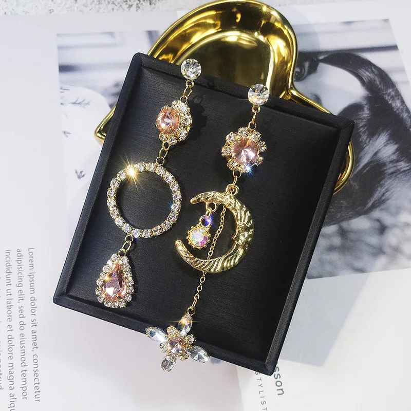 Fashion 925 Silver Needle Earrings for Women Asymmetrical Waterdrop Dazzling Crystal Champagne Long Eardrop Wedding Jewelry Hot
Fashion 925 Silver Needle Earrings for Women Asymmetrical Waterdrop Dazzling Crystal Champagne Long Eardrop Wedding Jewelry Hot
