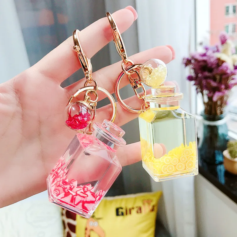 Cute girl heart floating fruit bottle keychain creative water world animal quicksand key chain bag pendant
Cute girl heart floating fruit bottle keychain creative water world animal quicksand key chain bag pendant
