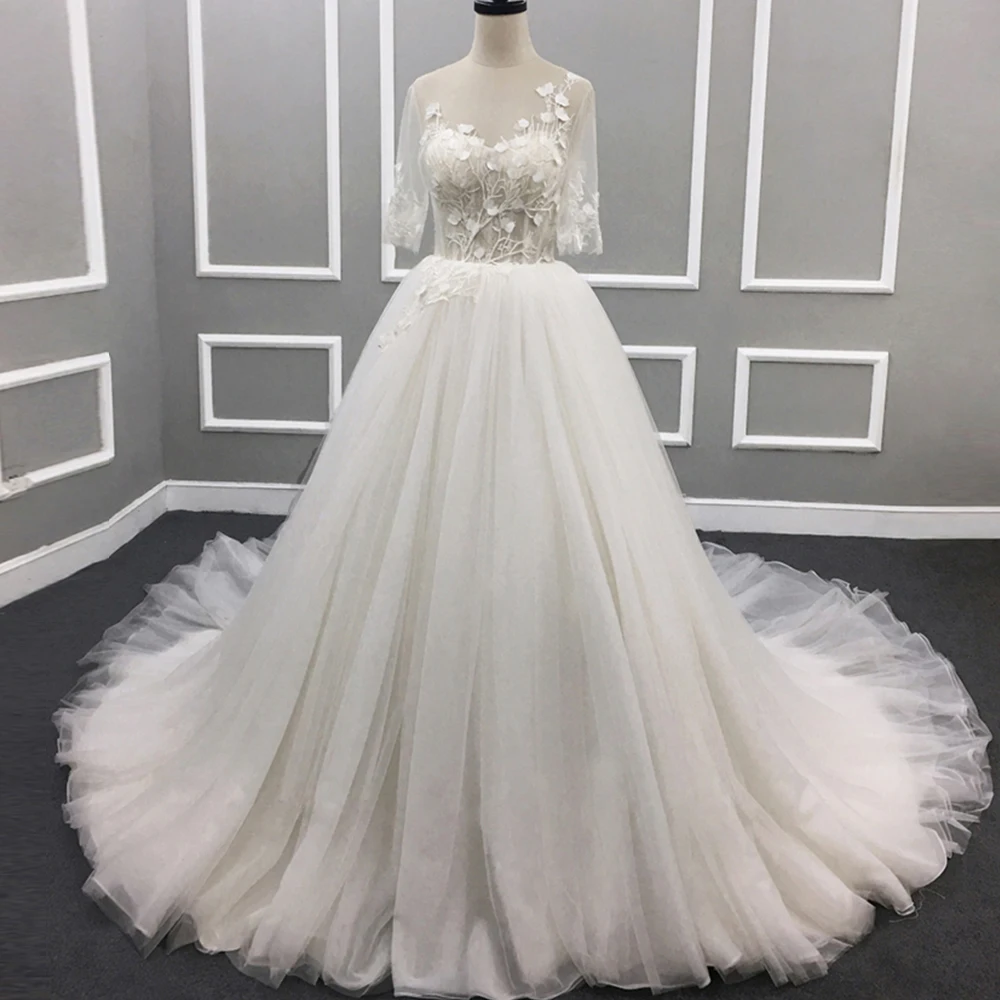 Robe De Mariage New Arrive Half Sleeve Sexy Backless Beading Lace Flowers Ball Gown Wedding Dress Plus Size Hochzeitskleid
Robe De Mariage New Arrive Half Sleeve Sexy Backless Beading Lace Flowers Ball Gown Wedding Dress Plus Size Hochzeitskleid