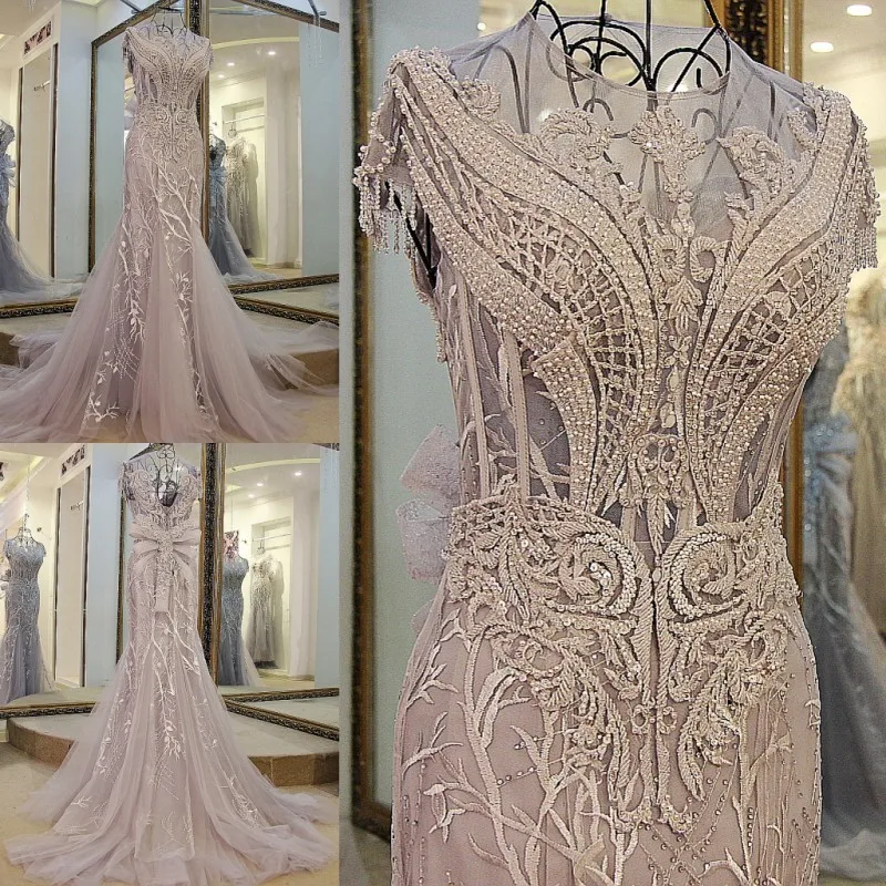 2017 tulle light grey luxury crystals Tassels cap sleeves sexy beaded illusion neckline design mermaid evening dress xj01980
2017 tulle light grey luxury crystals Tassels cap sleeves sexy beaded illusion neckline design mermaid evening dress xj01980